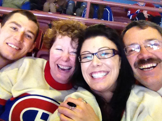 Shauna with her husband Richard and their children Justin and Jenna at a hockey game
